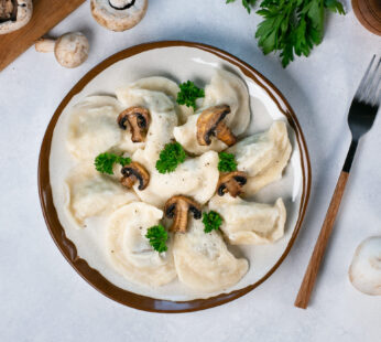 Varenyky with potatoes and mushrooms