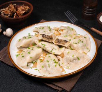 Varenyky with potatoes and porcini mushrooms