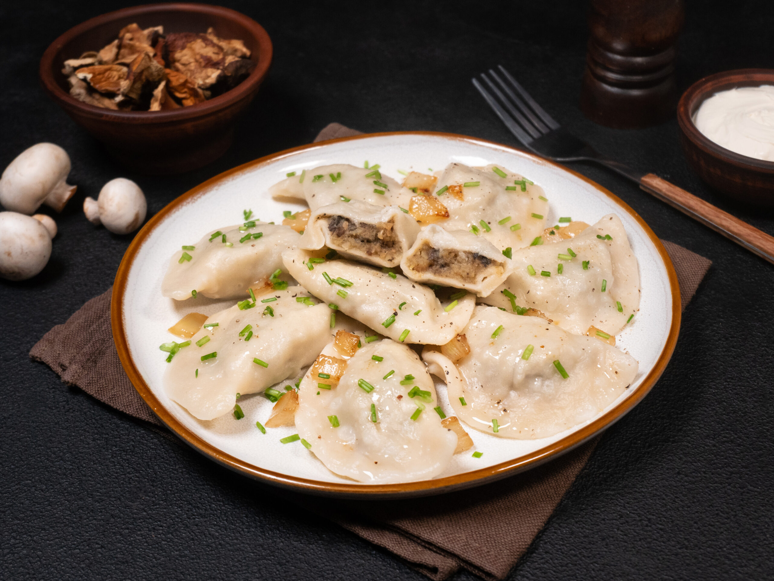 Varenyky with potatoes and porcini mushrooms