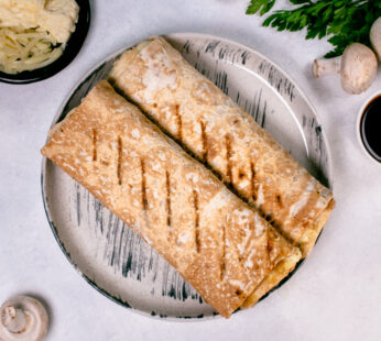 Tortilla with chicken,teriyaki,mushrooms and cheese