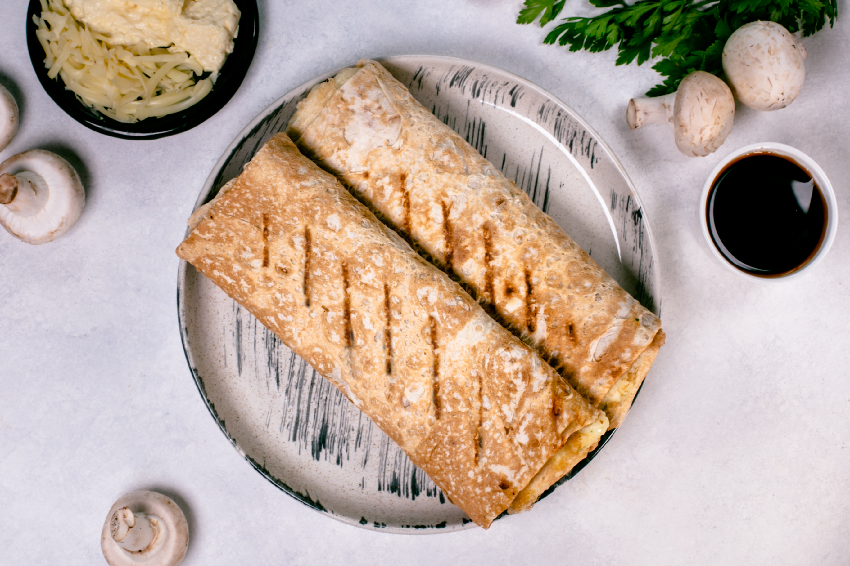 Tortilla with chicken,teriyaki,mushrooms and cheese